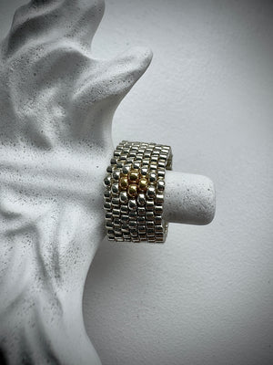 Golden Core Ring

Handwoven Silver & Gold Miyuki Beaded Statement Ring